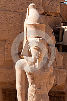 EGYPT, LUXOR - MARCH 01, 2019: ancient sandstone statues, Karnak Temple, Hall of caryatids. Luxor, Egypt