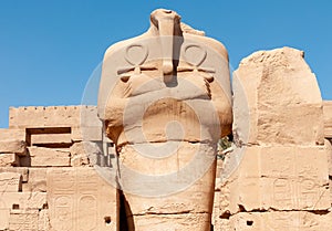 EGYPT, LUXOR - MARCH 01, 2019: ancient sandstone statues, Karnak Temple, Hall of caryatids. Luxor, Egypt