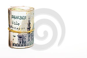 Egypt money roll pounds isolated on white background, 200 LE two hundred Egyptian pounds cash money bills rolled up