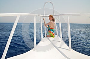 Egypt. Red sea. Beautiful girl at white yacht