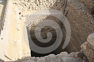 Egypt, Saqqara district. A well at an archaeological site.