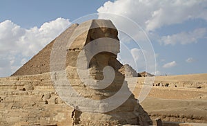 Egypt. The Sphinx (side view) and the pyramid of Cheops.