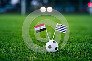 Egypt - Uruguay, Group A, Friday, 15. June, Football, World Cup, Russia 2018, National Flags on green grass, white football ball o