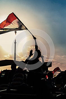 Egyptian Activist with Egyptian Flag Against Sunset