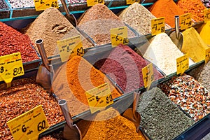 Egyptian Bazaar Market called Spices Market and the Grand Bazaar shopping place with dry spices powder and tea in Istanbul, Turkey