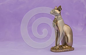 Egyptian cat Bast or Bastet, solar and war goddess, isolated on pink  background