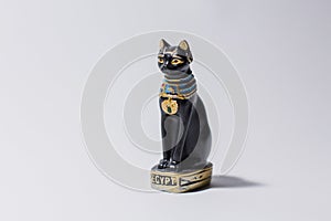 Egyptian cat statue on white background