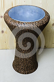 Egyptian darbuka on wooden background