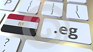 Egyptian domain .ru and flag of Egypt on the buttons on the computer keyboard. National internet related 3D animation
