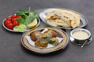 Egyptian falafel served in a pita bread with tahini sauce