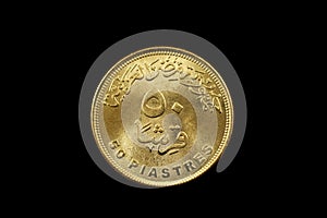 Egyptian Fifty Piastre Coin Isolated On A Black Background