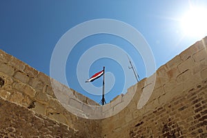 Egyptian flag on top of Citadel of Qaitbay, Egypt.