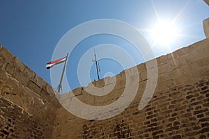 Egyptian flag on top of Citadel of Qaitbay, Egypt.