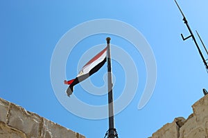 Egyptian flag on top of Citadel of Qaitbay, Egypt.