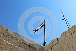 Egyptian Flag on top of qaitbey citadel in alexandria