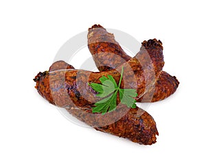 Egyptian food Mombar - beef sausage stuffed with rice fried in oil isolated white background