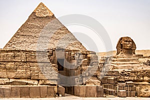 Egyptian Great Sphinx full body portrait head,with pyramids of Giza background Egypt empty with nobody. copy space