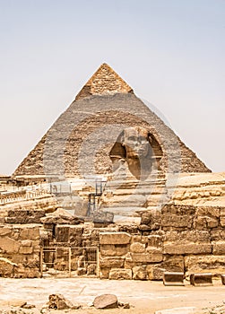 Egyptian Great Sphinx full body portrait head,with pyramids of Giza background Egypt empty with nobody. copy space