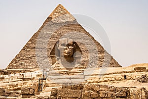 Egyptian Great Sphinx full body portrait head,with pyramids of Giza background Egypt empty with nobody. copy space