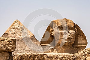 Egyptian Great Sphinx full body portrait head,with pyramids of Giza background Egypt empty with nobody. copy space