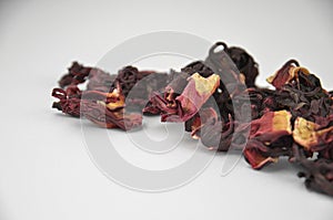 Egyptian hibiscus dry red tea (karkade) aligned pile (line)