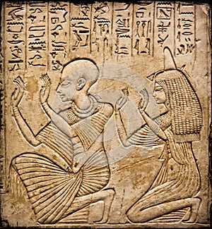 Egyptian hieroglyphs and human figures