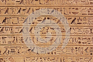 Egyptian hieroglyphs stone background