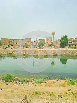 Egyptian houses on the banks of the Nile, on the road from Luxor, slums of Egypt