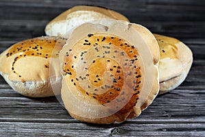 Egyptian Mahlab bread, puff thin, crispy and delicious with black seed baraka seeds on top, made of flour, dry yeast, milk, eggs,