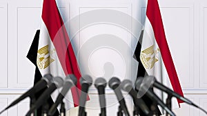 Egyptian official press conference. Flags of Egypt and microphones. Conceptual animation
