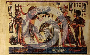 Egyptian papyrus with Ra sun rays with figures and signs.