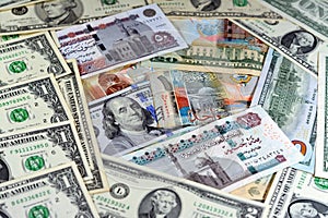 Egyptian pounds currency with American USA dollars cash money banknotes of different values and Kuwait dinars bills, Kuwaiti money