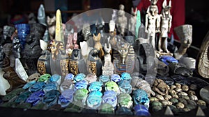 Egyptian souvenir stone craft to pharaoh sphinx pyramid scarab statues selling for tourist in Egypt