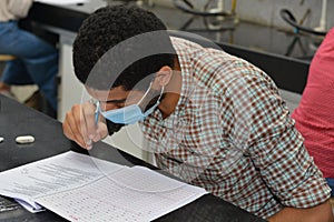 Egyptian Students wearing masks and taking final year exams with precautionary and strict measures amid coronavirus pandemic