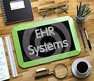 EHR Systems on Small Chalkboard. 3D. photo