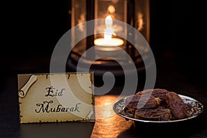 Eid mubarak card with dates and lantern