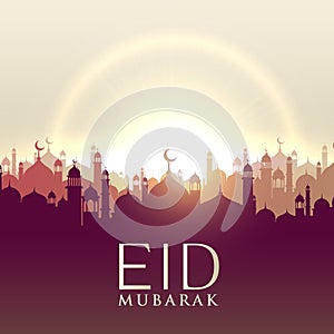 Eid mubarak card with mosque silhouttes photo