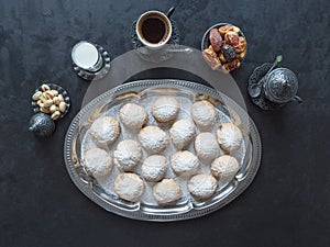 Eid and Ramadan Dates Sweets - Arabian cuisine background. Egyptian cookies `Kahk El Eid`.