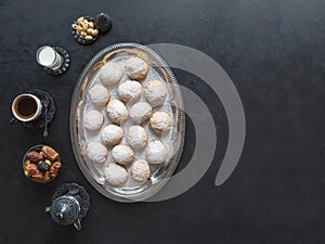 Eid and Ramadan Dates Sweets - Arabian cuisine background. Egyptian cookies `Kahk El Eid`. Top view, copy space