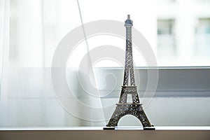 Eifel Tower Model with white curtain