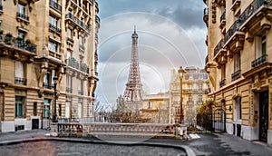 The eifel tower in Paris from a tiny street