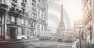 The eifel tower in Paris from a tiny street