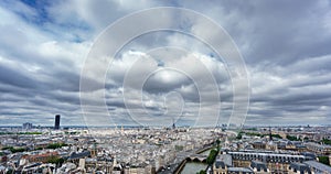 Eiffel and Montparnasse towers over Paris, cloudy day