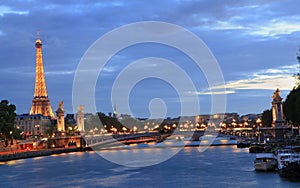 Eiffel Tower and Alexandre III Bridge at dusk, Paris