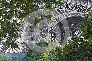 Eiffel Tower close up on summer sunny day