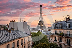 Eiffel Tower and colorful sky in Paris from rooftop photo