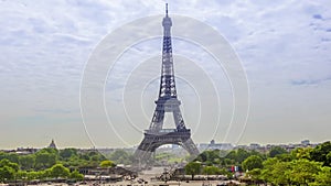 Eiffel tower and day clouds. Time lapse