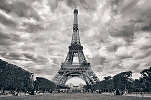 Eiffel tower with dramatic sky monochrome black an