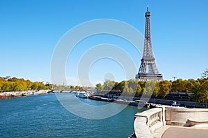 Eiffel tower and empty white balcony on Seine river in Paris
