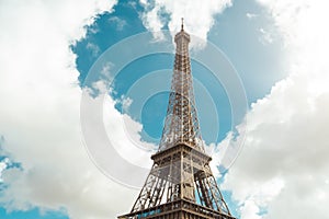 Eiffel tower and heart shape in clouds